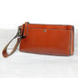Caravel Wristlet Clutch - Luxury Leather Handbag in Cognac Urban-Equestrian