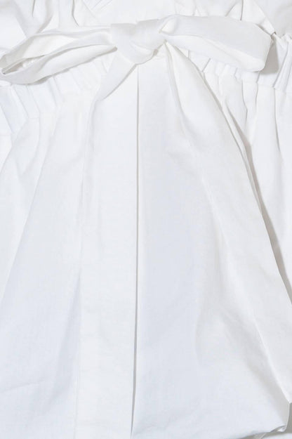 SLOW DOWN IN WHITE WOVEN TOP Flying Tomato