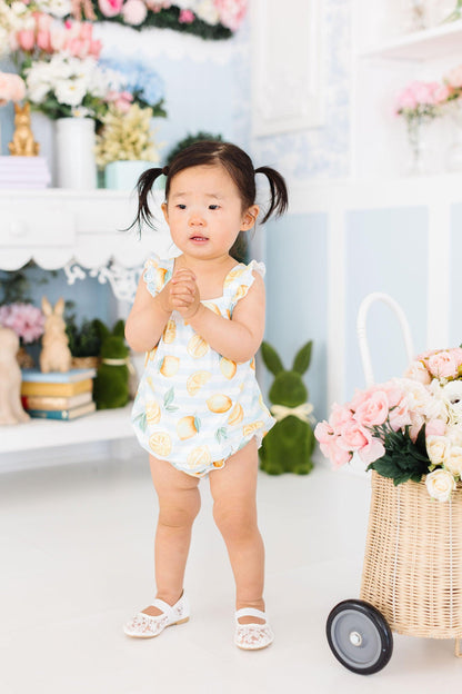 Lovely Lemons Ruffle Cross Back Romper