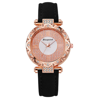Korean-style quartz watch with a simple leather strap.