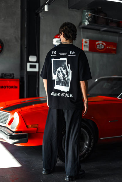 Oversize Graphic Cotton Tee – Impossible Game Over Print Withinblack