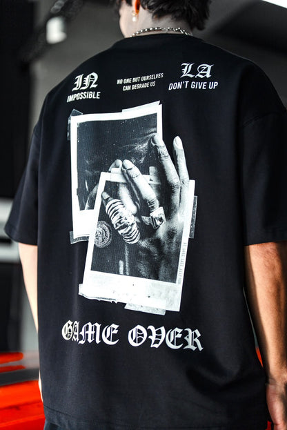 Oversize Graphic Cotton Tee – Impossible Game Over Print Withinblack