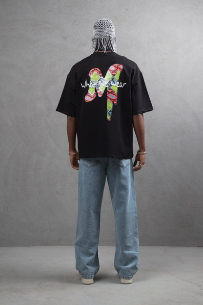 Oversize Graphic Cotton Tee – "What We Wear" Abstract Print Withinblack