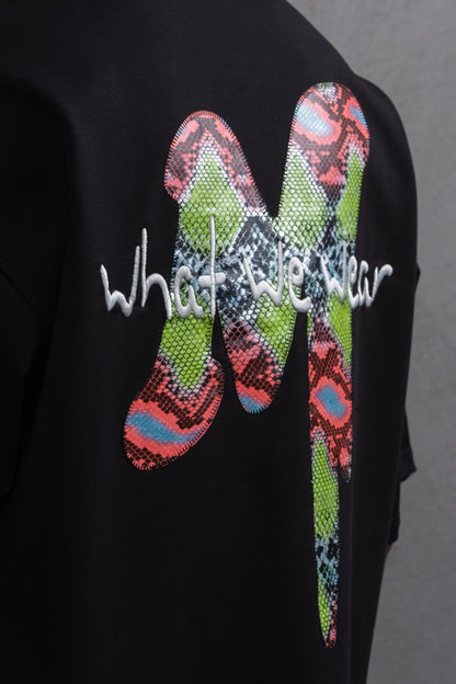 Oversize Graphic Cotton Tee – "What We Wear" Abstract Print Withinblack