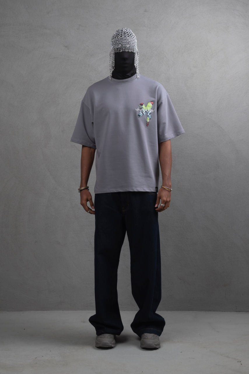 Oversize Graphic Cotton Tee – "What We Wear" Abstract Print Withinblack