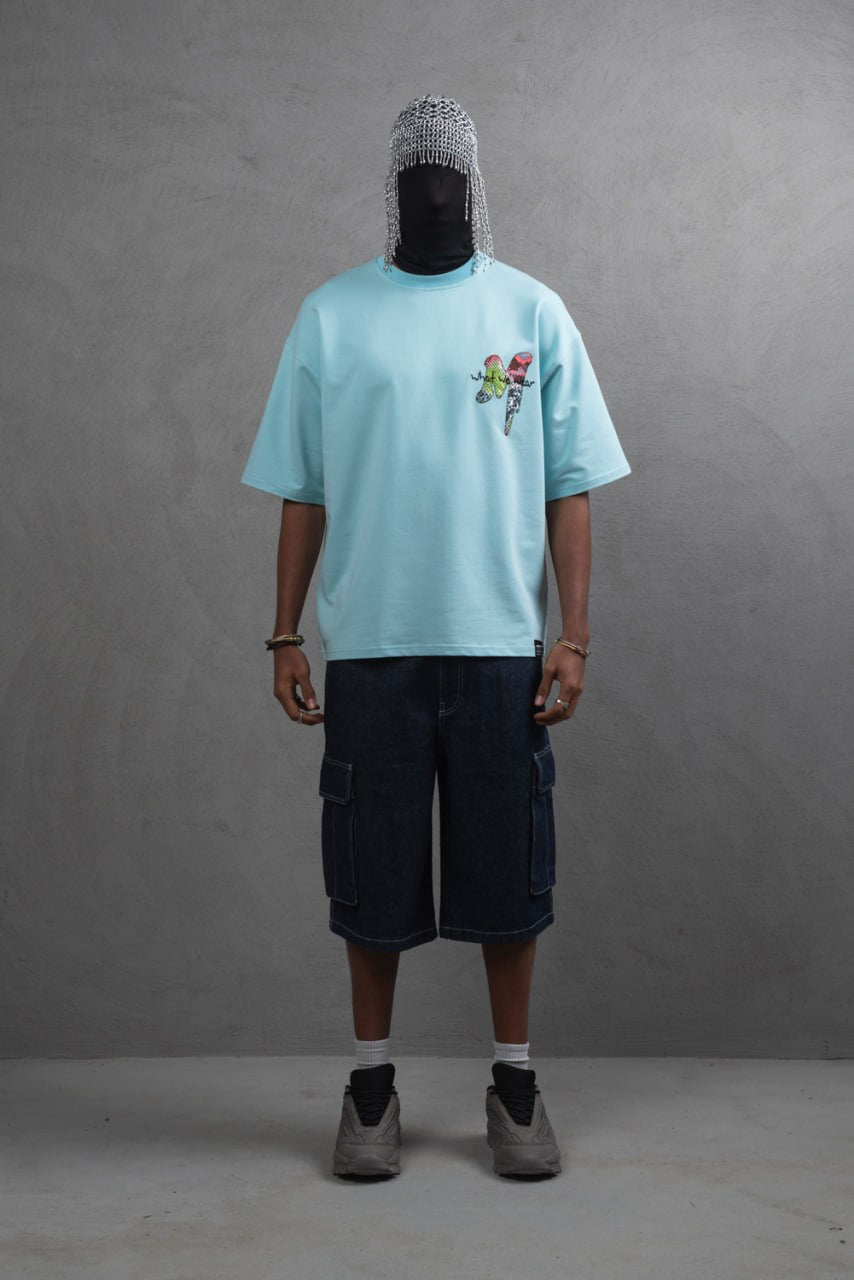 Oversize Graphic Cotton Tee – "What We Wear" Abstract Print Withinblack