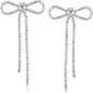 Sparkly Dangling Silver Bow Long Silver Earrings