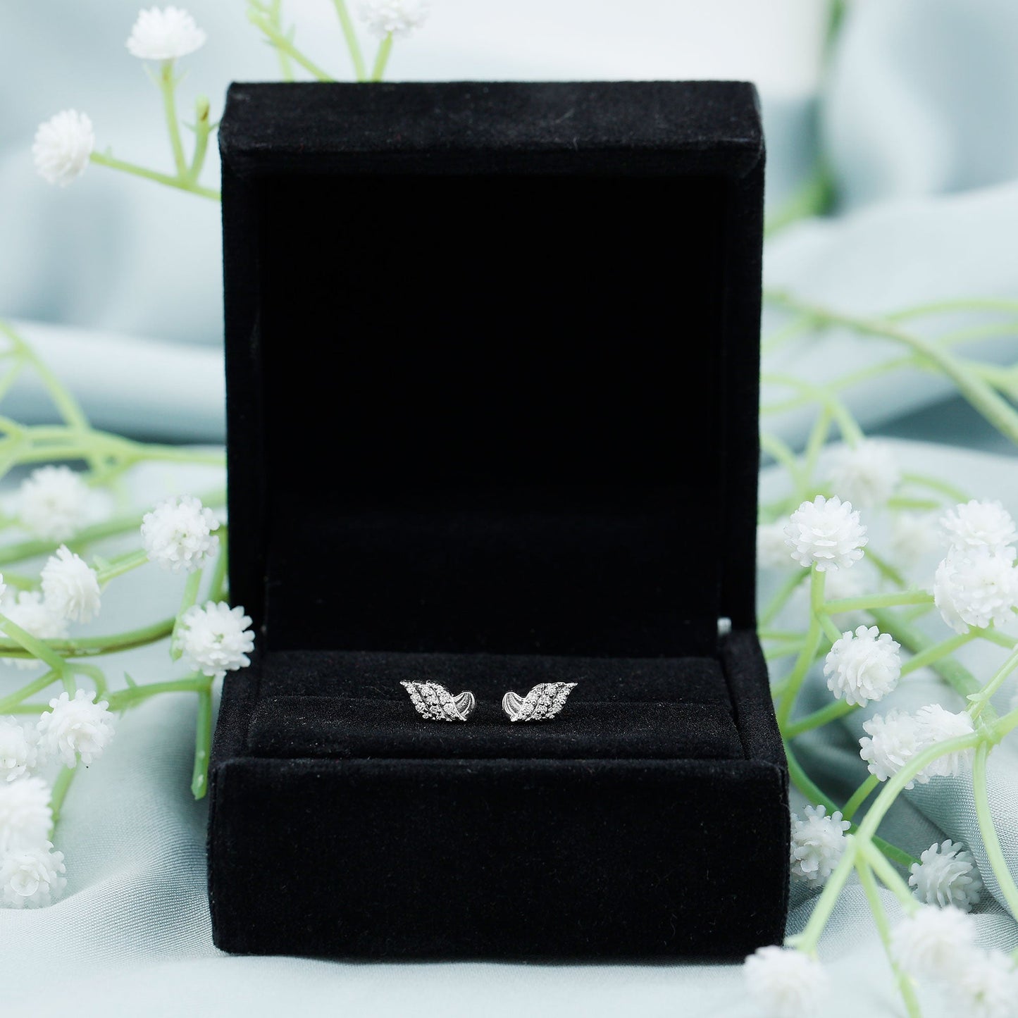 Contemporary Moissanite Leaf Stud Earrings in Silver