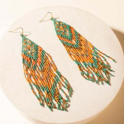 Myra Sundance Ember Beaded Fringe Earrings in Gilded Coral Myra USA