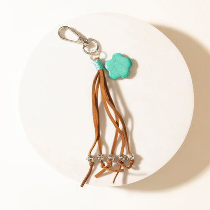 Myra Rangeflower Tassel Charm Keychain in Suede Brown Myra USA