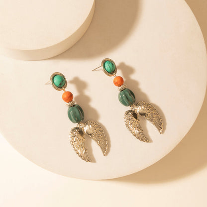 Myra Guardian Wing Dangle Earrings in Sterling Silver Myra USA