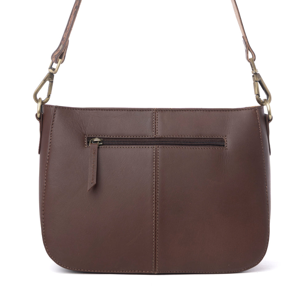 Myra Copper Crest Handtooled Hairon Leather Clutch in Saddle Walnut Myra USA
