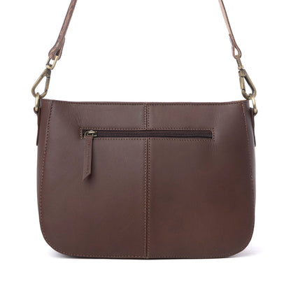 Myra Copper Crest Handtooled Hairon Leather Clutch in Saddle Walnut Myra USA