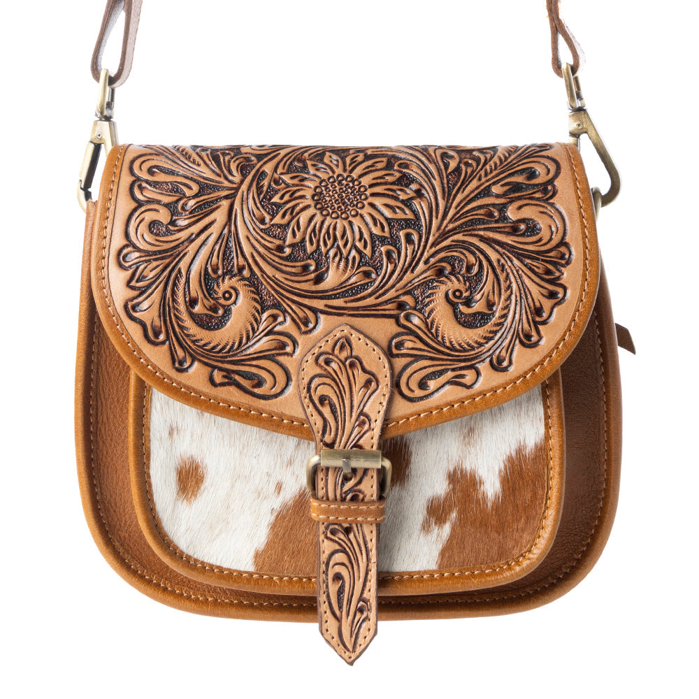 Myra Goldrush Saddle handtooled Bag for Women in saddle tan with hair-on detail Myra USA