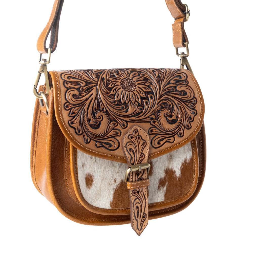 Myra Goldrush Saddle handtooled Bag for Women in saddle tan with hair-on detail Myra USA