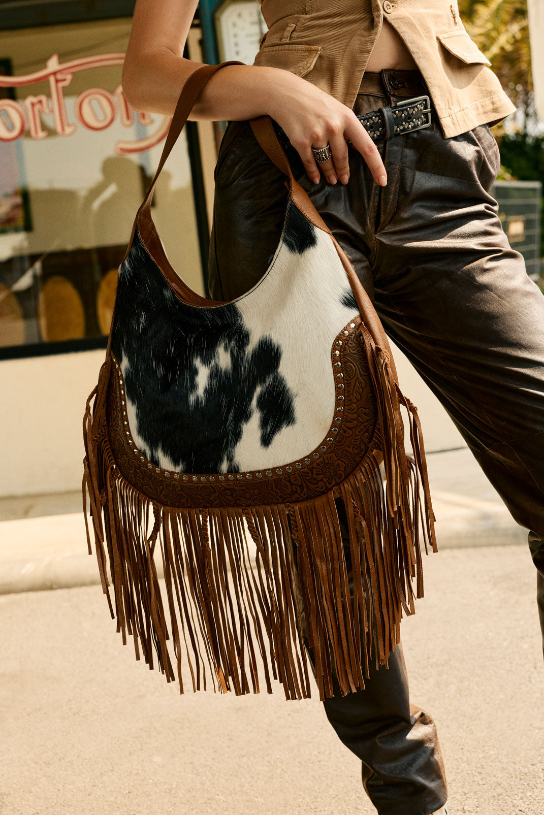 Myra Lasso Lane Hairon Leather Bag for Women in brown with fringe and embossed detail Myra USA