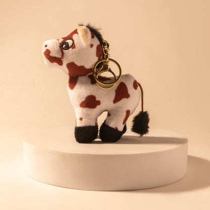 Myra Little Pinto Bag Charm in Ivory Spot Myra USA