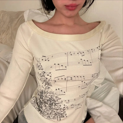 Women´s Slim Fit Off-Shoulder Top - Long Sleeve Ruffle Trim with Note Print NovaCart