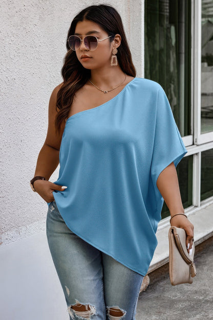 Plus One Shoulder Solid Casual Loose Fit Shirt See size chart under “more details” The Fashion Celestial