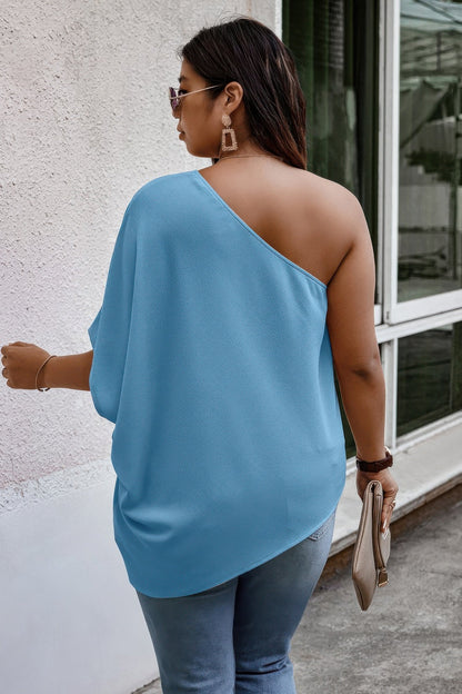 Plus One Shoulder Solid Casual Loose Fit Shirt See size chart under “more details” The Fashion Celestial