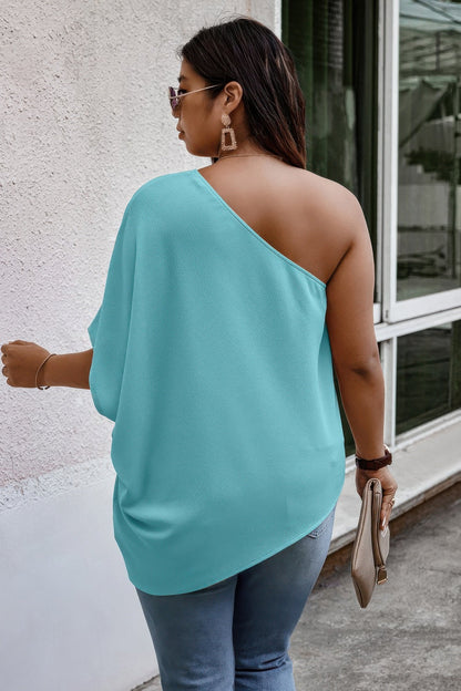 Plus One Shoulder Solid Casual Loose Fit Shirt See size chart under “more details” The Fashion Celestial