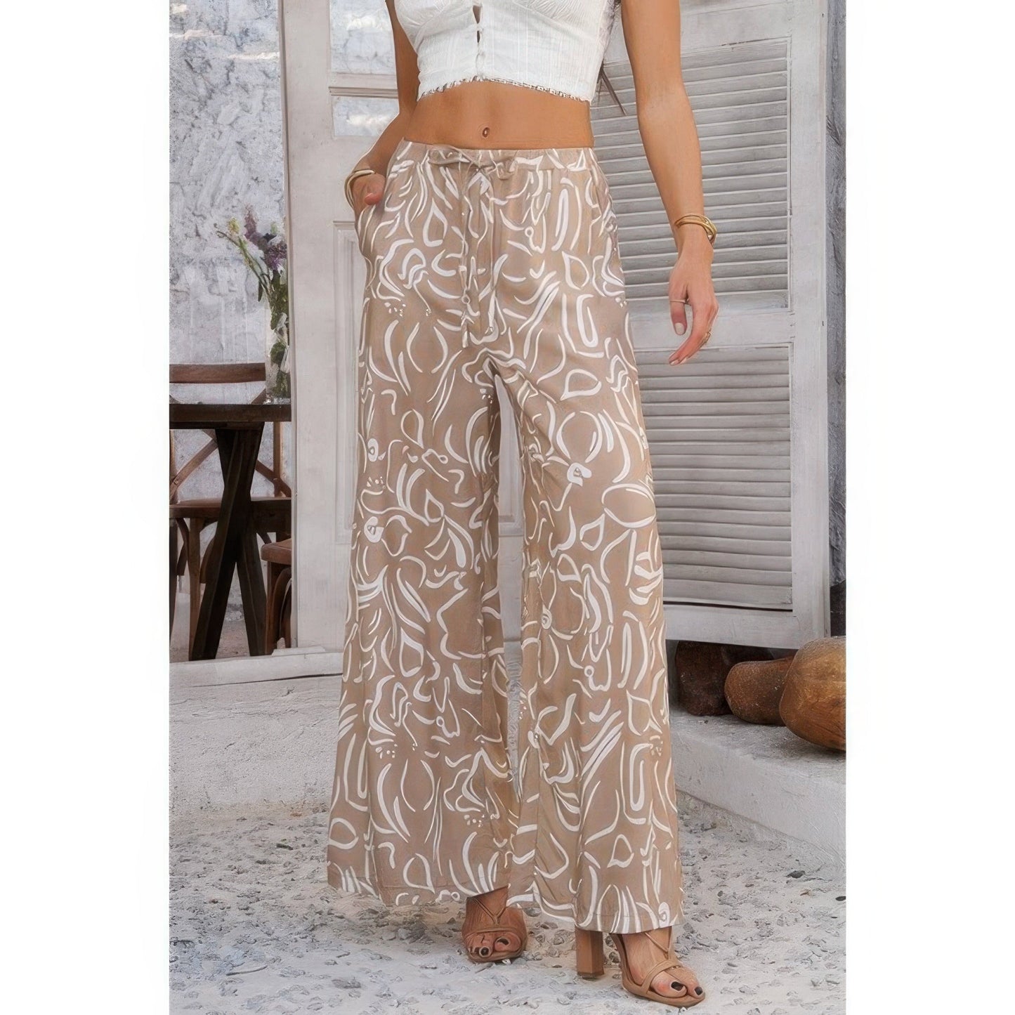 Allover Print Drawstring Pockets Wide Leg Pants See size chart under “more details” The Fashion Celestial