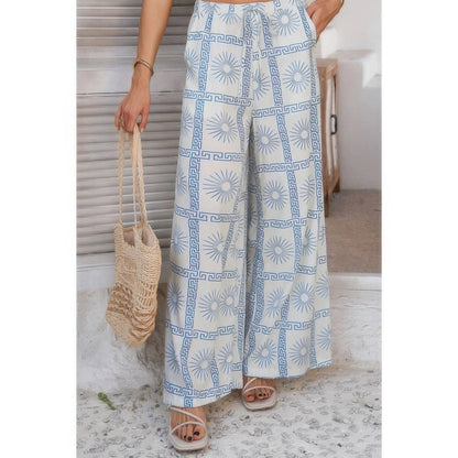 Allover Print Drawstring Pockets Wide Leg Pants See size chart under “more details” The Fashion Celestial