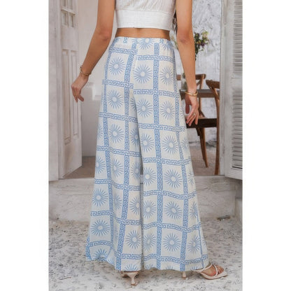Allover Print Drawstring Pockets Wide Leg Pants See size chart under “more details” The Fashion Celestial