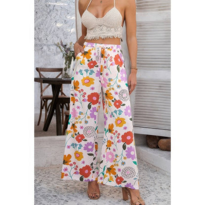 Allover Print Drawstring Pockets Wide Leg Pants See size chart under “more details” The Fashion Celestial