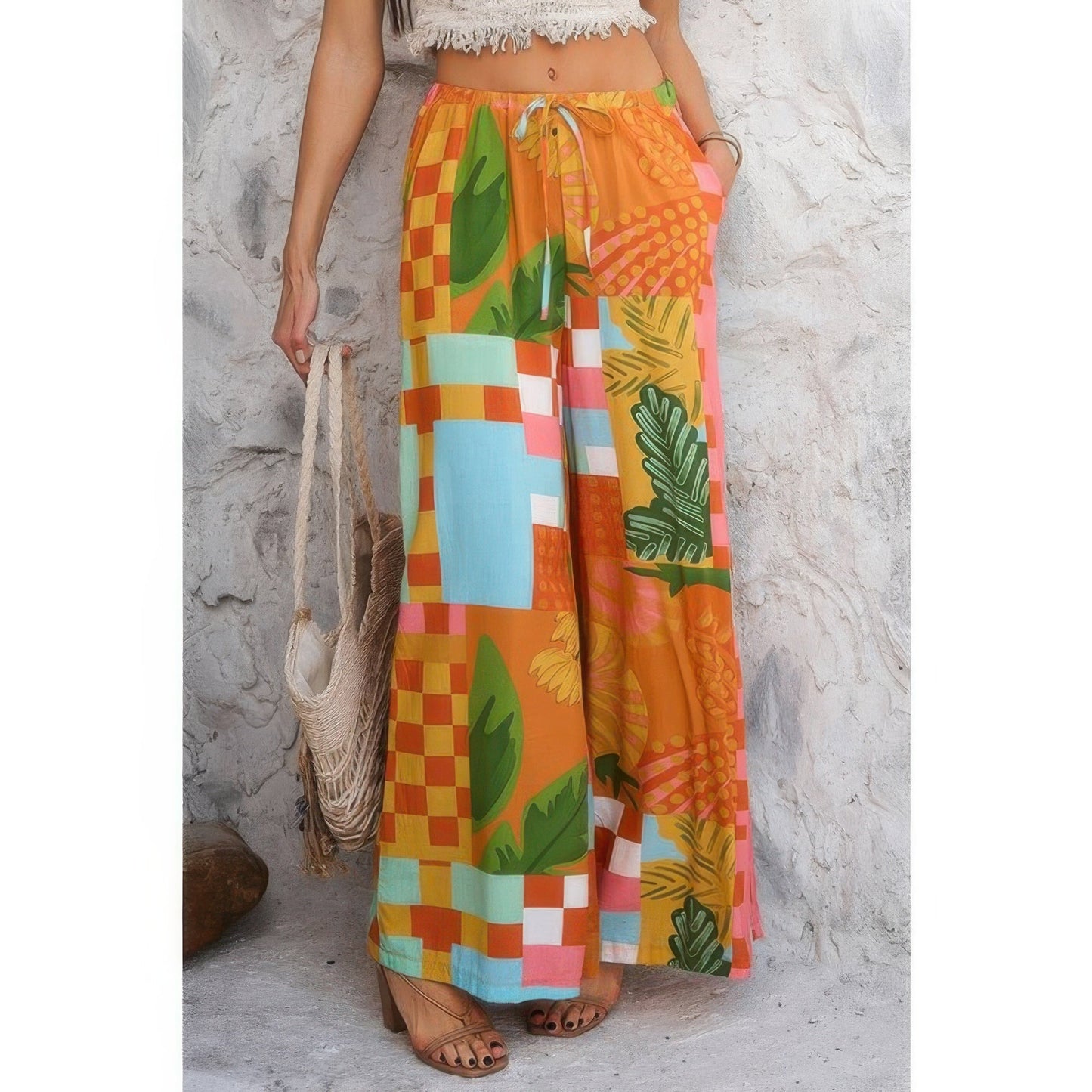 Allover Print Drawstring Pockets Wide Leg Pants See size chart under “more details” The Fashion Celestial