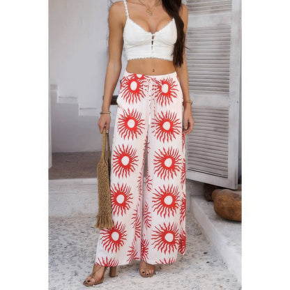 Allover Print Drawstring Pockets Wide Leg Pants See size chart under “more details” The Fashion Celestial