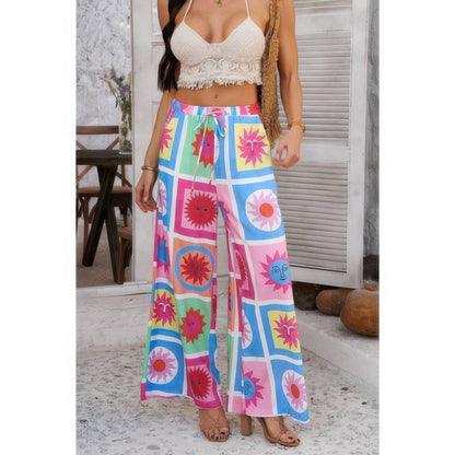 Allover Print Drawstring Pockets Wide Leg Pants See size chart under “more details” The Fashion Celestial
