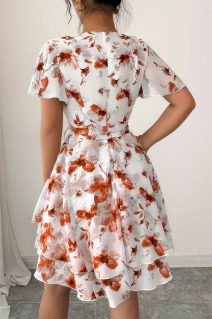 Floral V Neck Ruffle Sleeve Tie Belt Dress See size chart under “more details” The Fashion Celestial