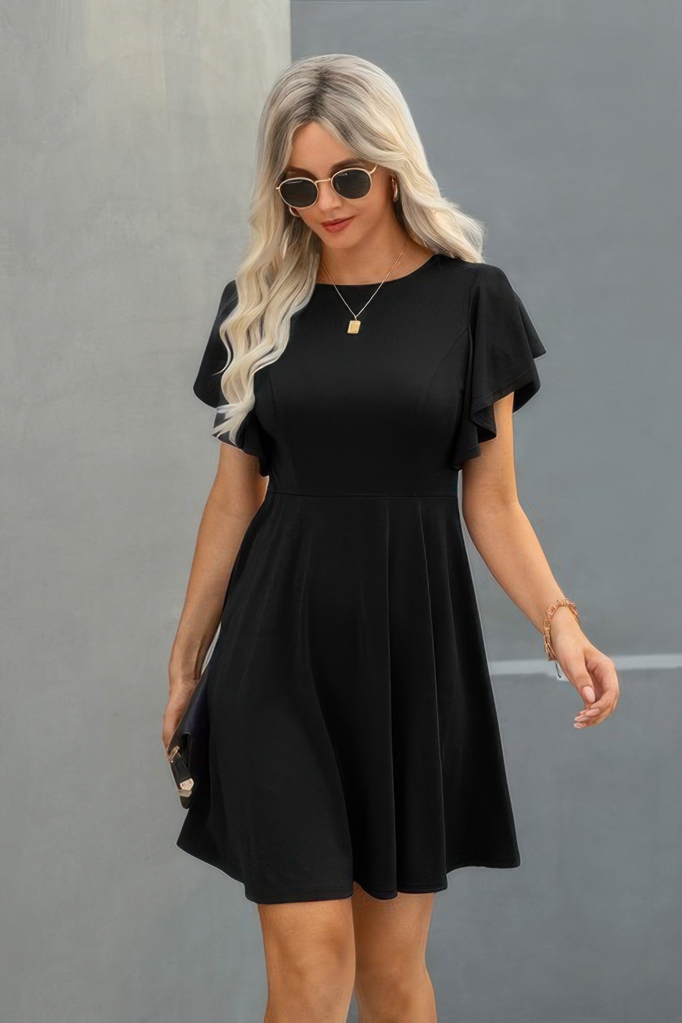 Crew Neck Ruffled Short Sleeve Solid Dress See size chart under “more details” The Fashion Celestial