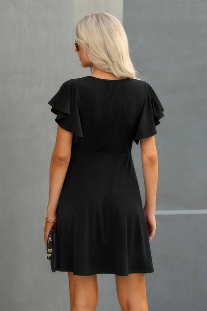 Crew Neck Ruffled Short Sleeve Solid Dress See size chart under “more details” The Fashion Celestial