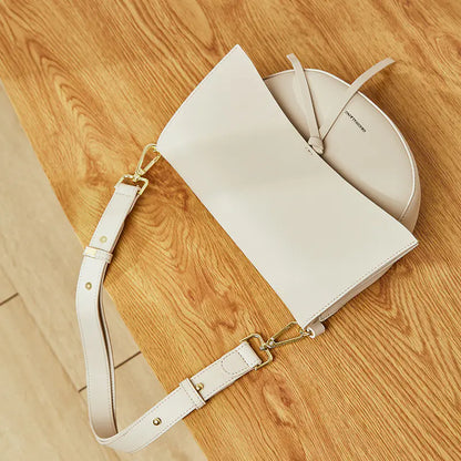 Versatile Leather Shoulder Bag with Retro Saddle Design