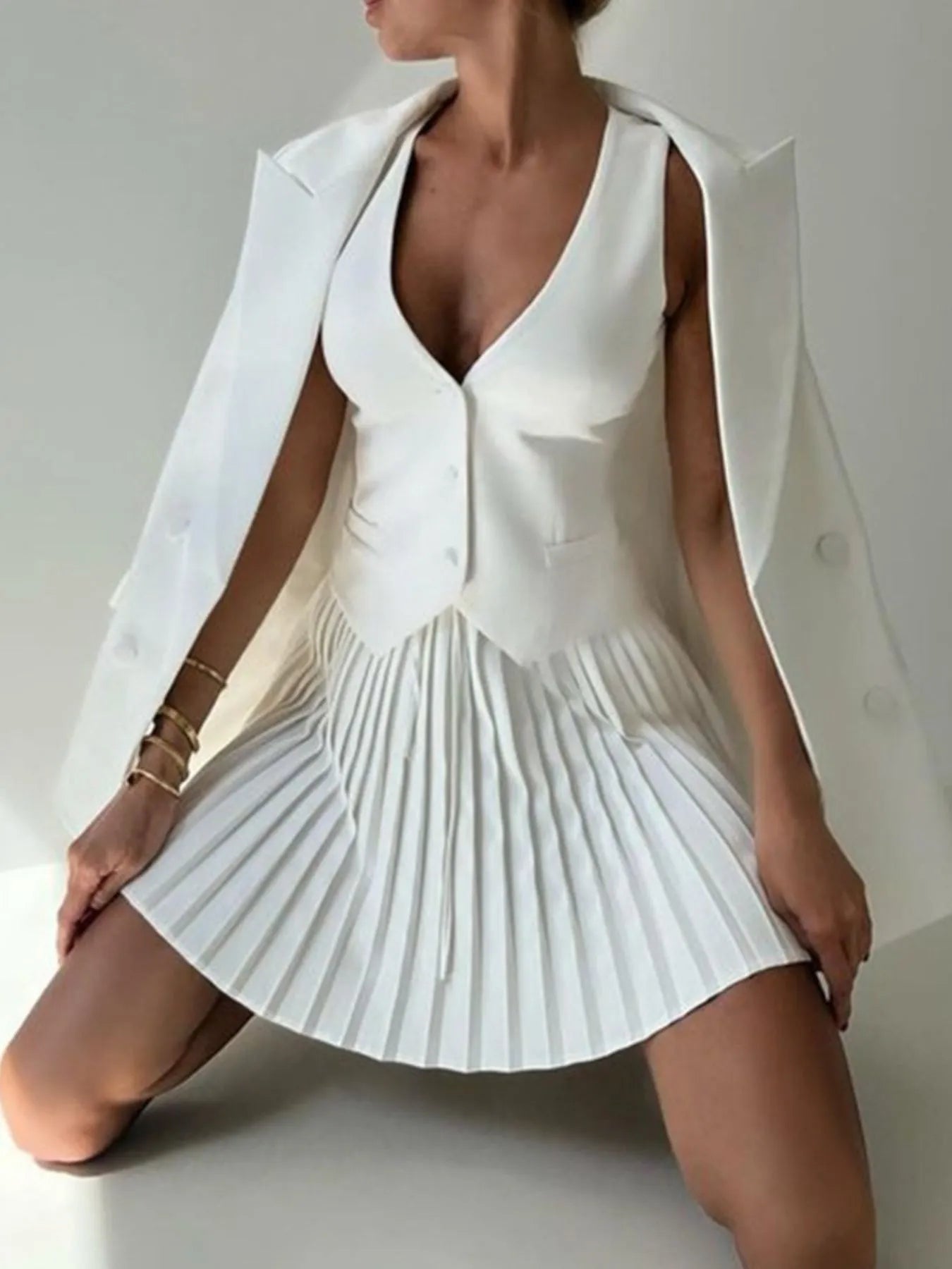 Button Up Vest and Pleated Mini Skirt Set See size chart under “more details” The Fashion Celestial