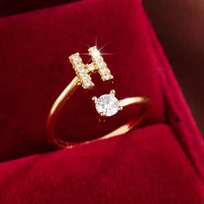 Adjustable Copper Initial Ring with Four-Claw Round Zirconia