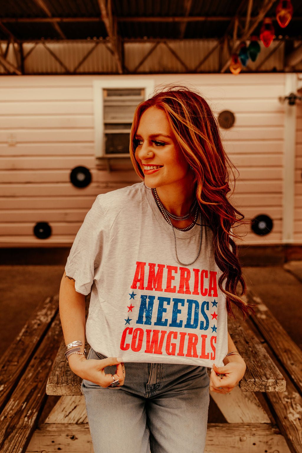 America Needs Cowgirls Graphic Tee Wild Junkie