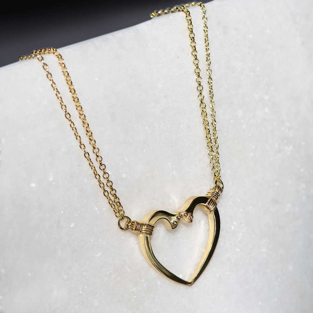 Ava - Equestrian Horseshoe Nail Heart Necklace in Gold Urban-Equestrian