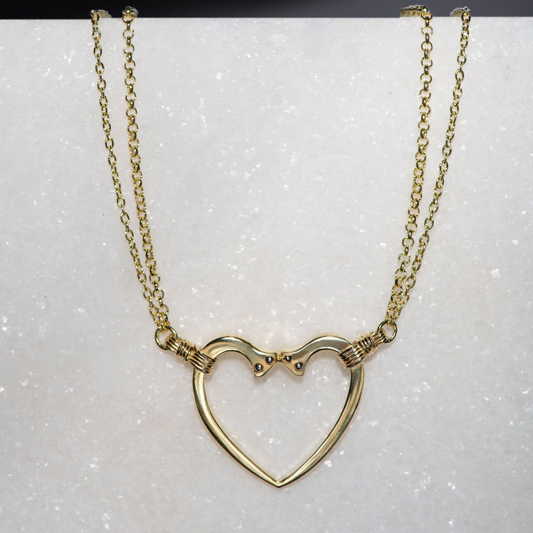 Ava - Equestrian Horseshoe Nail Heart Necklace in Gold Urban-Equestrian