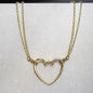 Ava - Equestrian Horseshoe Nail Heart Necklace in Gold Urban-Equestrian
