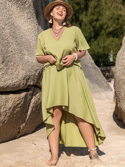 Plus Size V-Neck Half Sleeve Top and High-Low Skirt Set See size chart under “more details” The Fashion Celestial