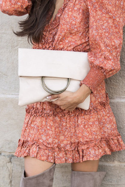 Fold-over O-ring Clutch See size chart under “more details” The Fashion Celestial