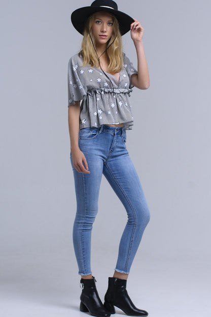 Black top with stars and ruffle Q2store