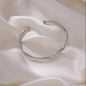 A Sleek And Stylish Twisted Texture Golden Bangle NovaCart