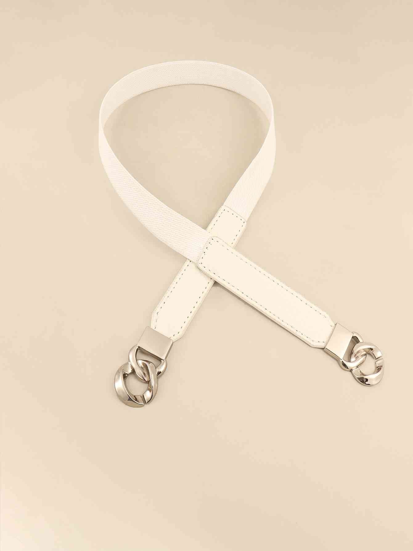 ElegantStyle Zinc Alloy Buckle Elastic PU Belt – Versatile and Stylish Accessory See size chart under “more details” The Fashion Celestial