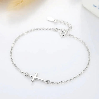 Whispered Grace Cross Bracelet Ivory Embers