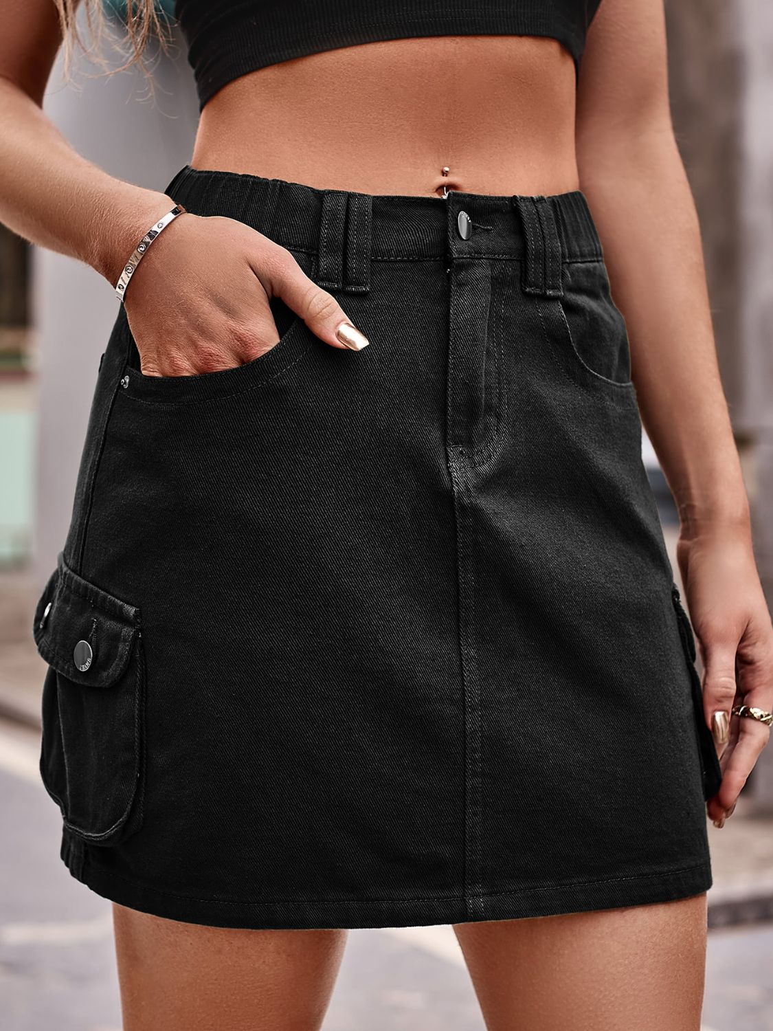 Denim Mini Skirt with Pockets See size chart under “more details” The Fashion Celestial
