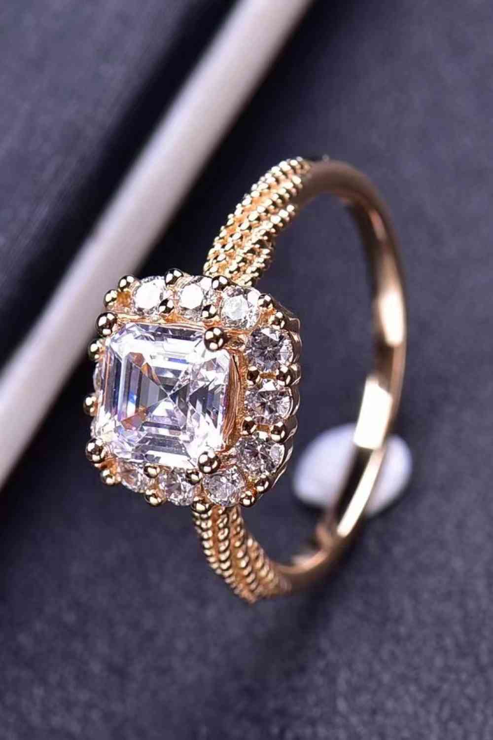 ElegantGem 1 Carat Moissanite Twisted Ring – Minimalist 18K Rose Gold Design See size chart under “more details” The Fashion Celestial